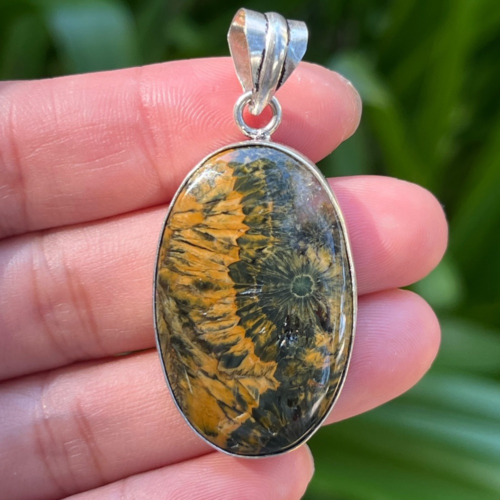 Silver plated fossilized coral pendant